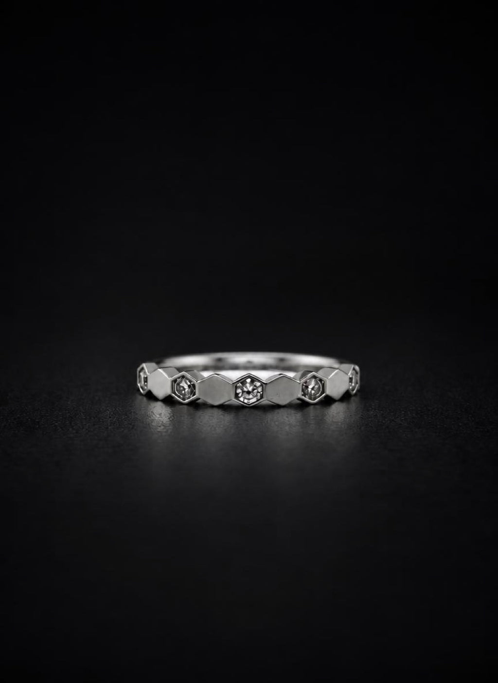 Hexagonal Duo alternating hexagon ring on black background
