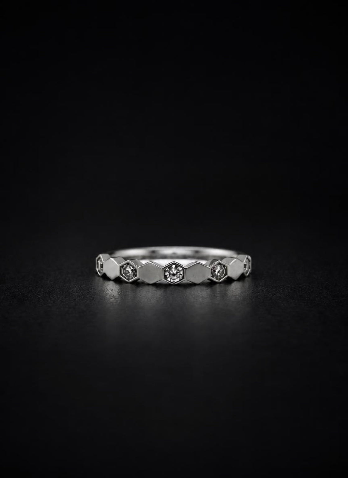Hexagonal Duo alternating hexagon ring on black background